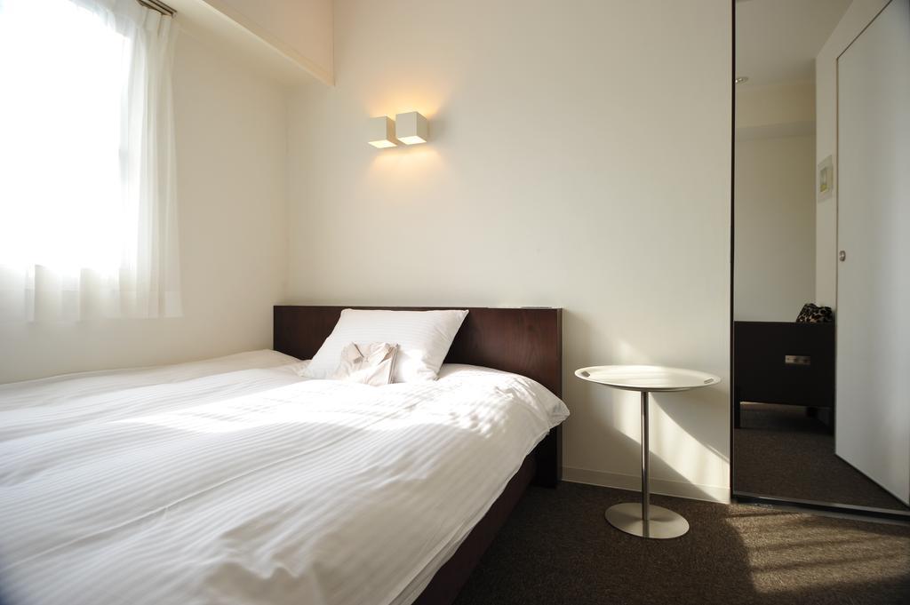 7 Days Hotel Plus Kōchi Стая снимка